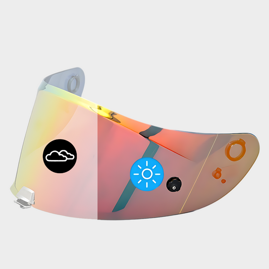 A red photochromic visor for HJC-26 helmets showing a gradient color change from clear red to mirrored red/gold and various symbols indicating UV levels.