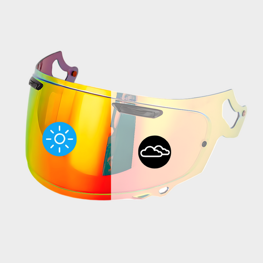A red photochromic visor for ARAI VAS-V RX7 helmet, showing a gradient color change from clear red to mirrored red/gold.